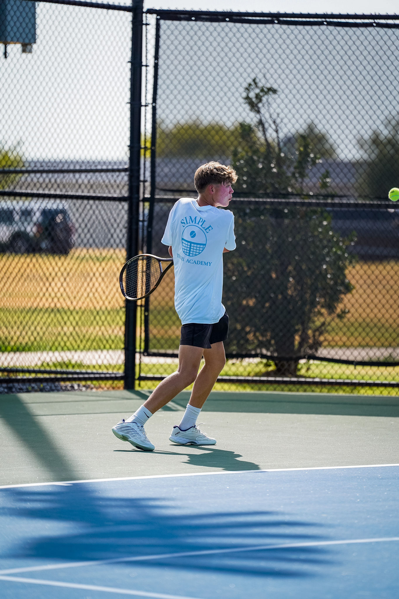 SIMPLE Tennis Academy athlete training on court