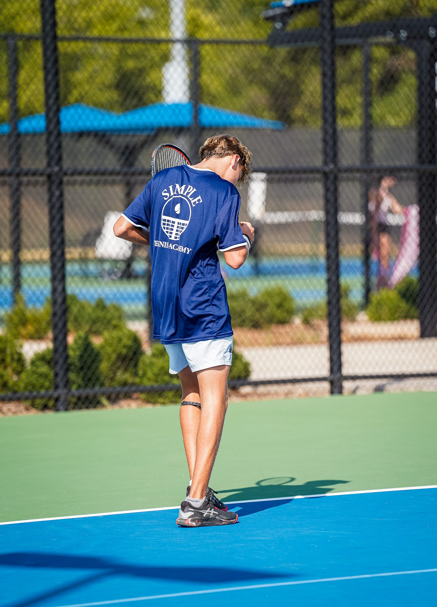 SIMPLE Tennis Academy athlete training on court